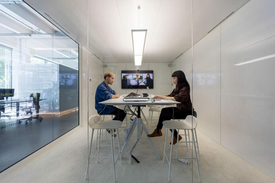 Team members share an office